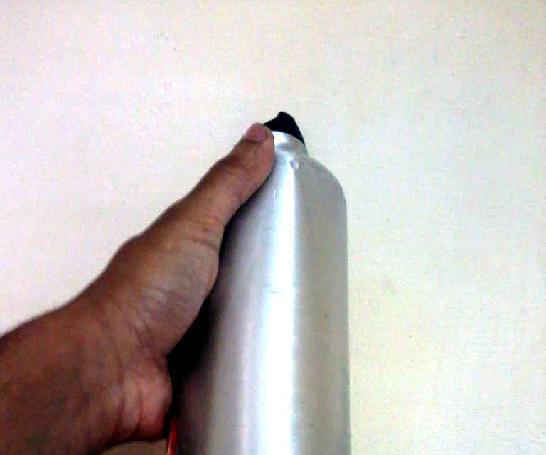How to stop dented bottle from toppling 