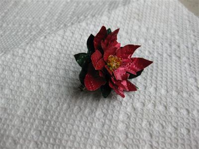 Final Flower Brooch and Examples of Other Shim Stock Flowers