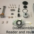 Disassembling a CD/DVD reader and reusing its parts
