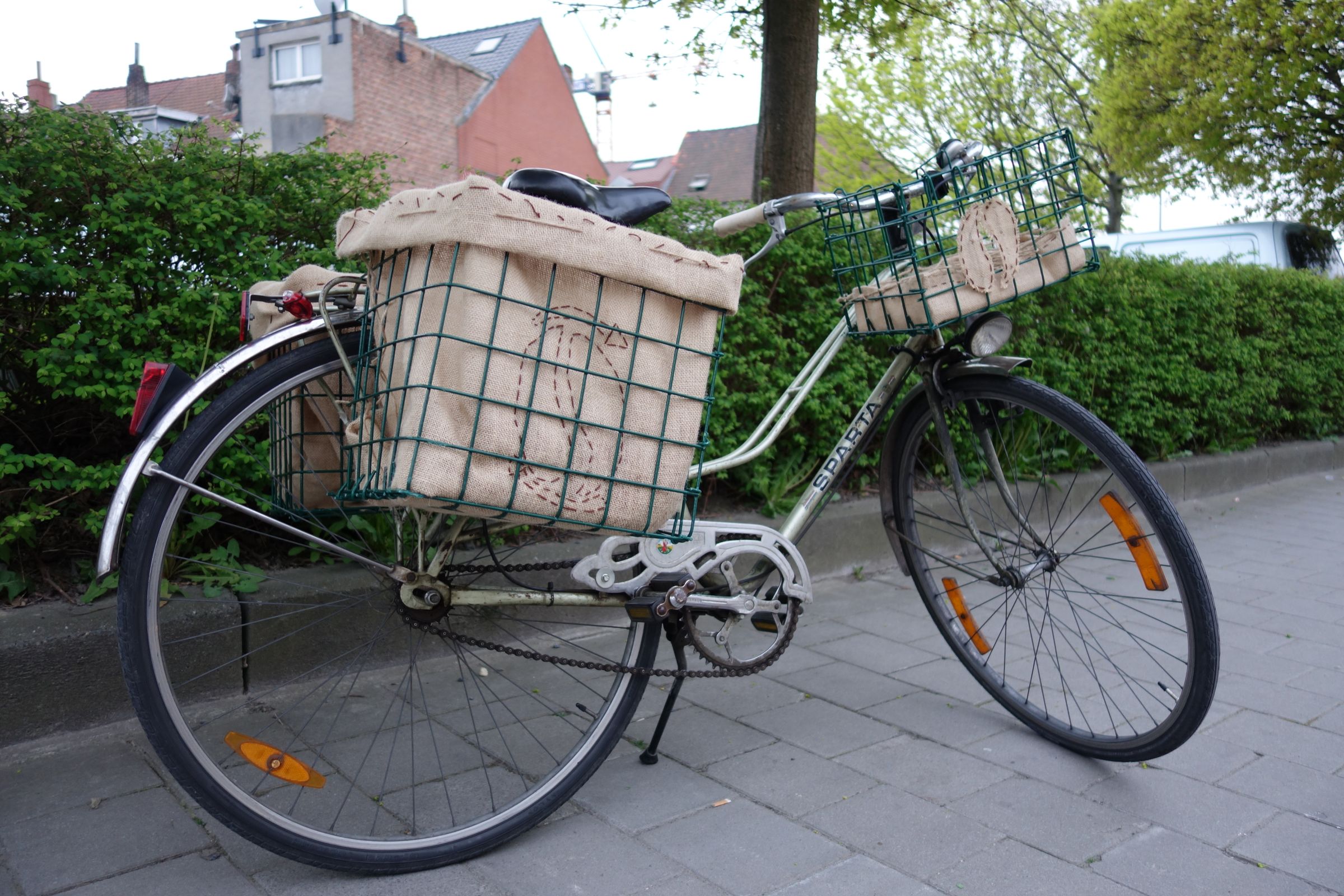 Burlap sack for bicycle basket