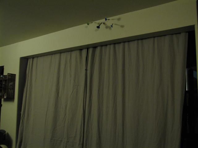 (virtually) Invisible Tension Wire Curtain Rod.