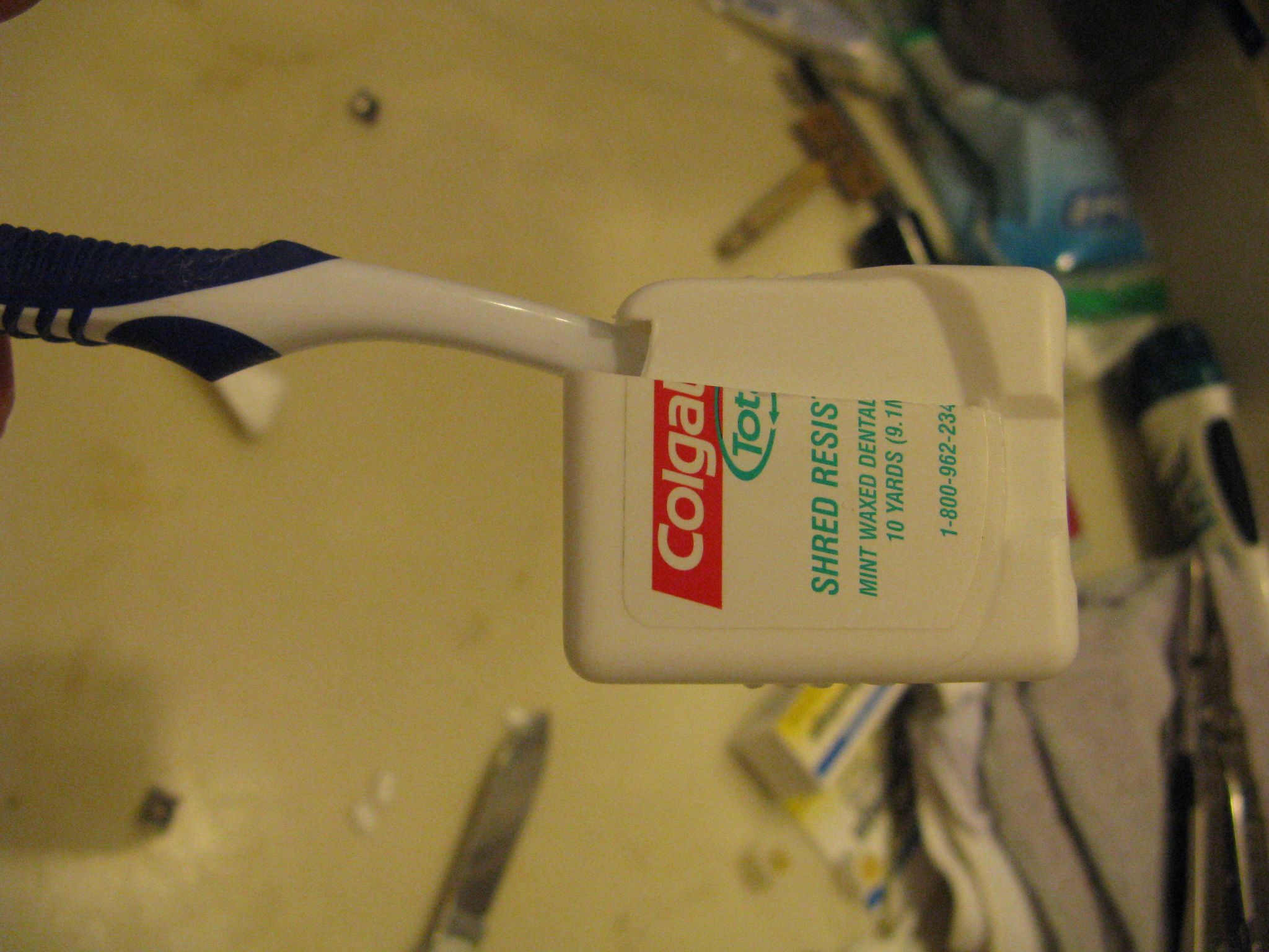 Make a Toothbrush Cover out of a Floss Container