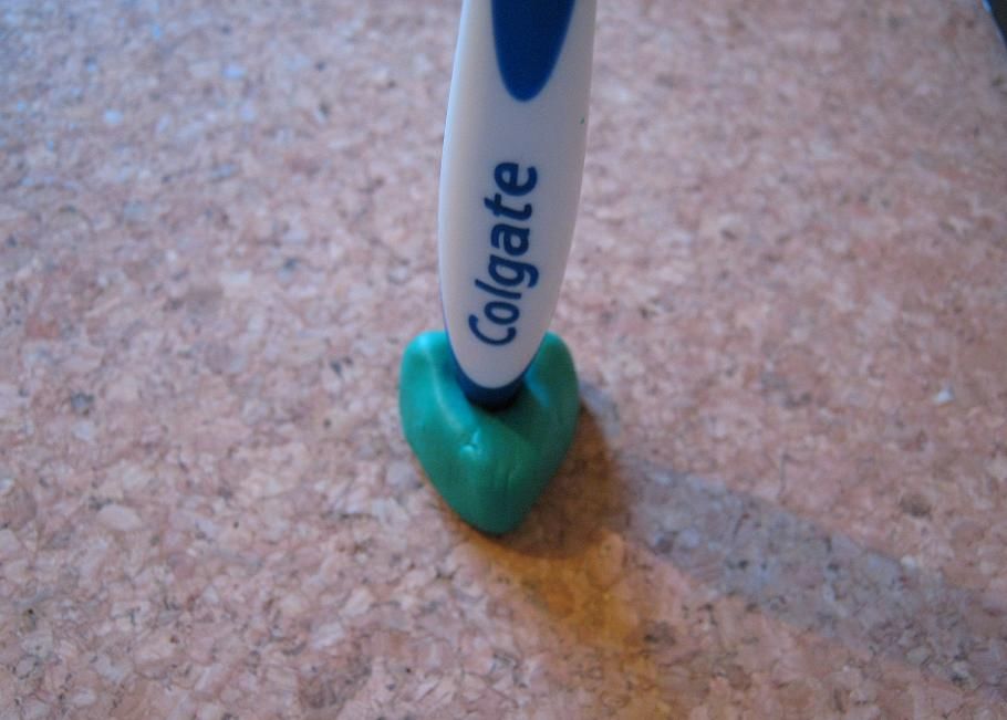 Self Righting Toothbrush Stand