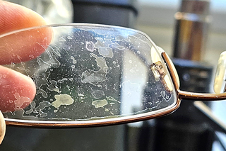 Eyeglass coating repair shop