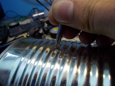 Drill Two Holes for the Wires and Another One for the Switch in the Tall Can