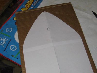 Build Up the Shape of the Shark Around the Balloon Using Cardboard