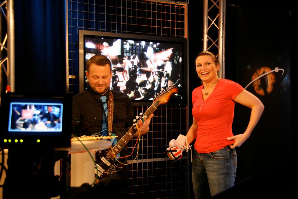 Play Rock Band 2 With a Real Guitar and Boxing Gloves