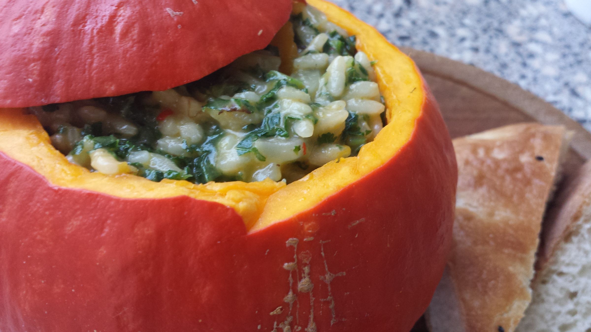 Pumpkin Risotto With Kale Served in a Pumpkin