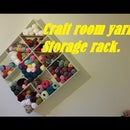 Yarn shelves for craft room storage.