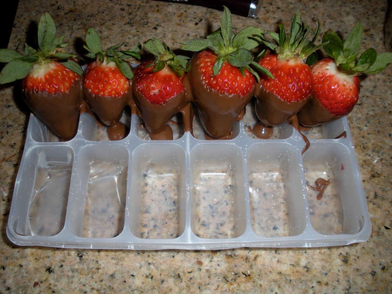 A colorful spread of fruit and chocolate on a plate