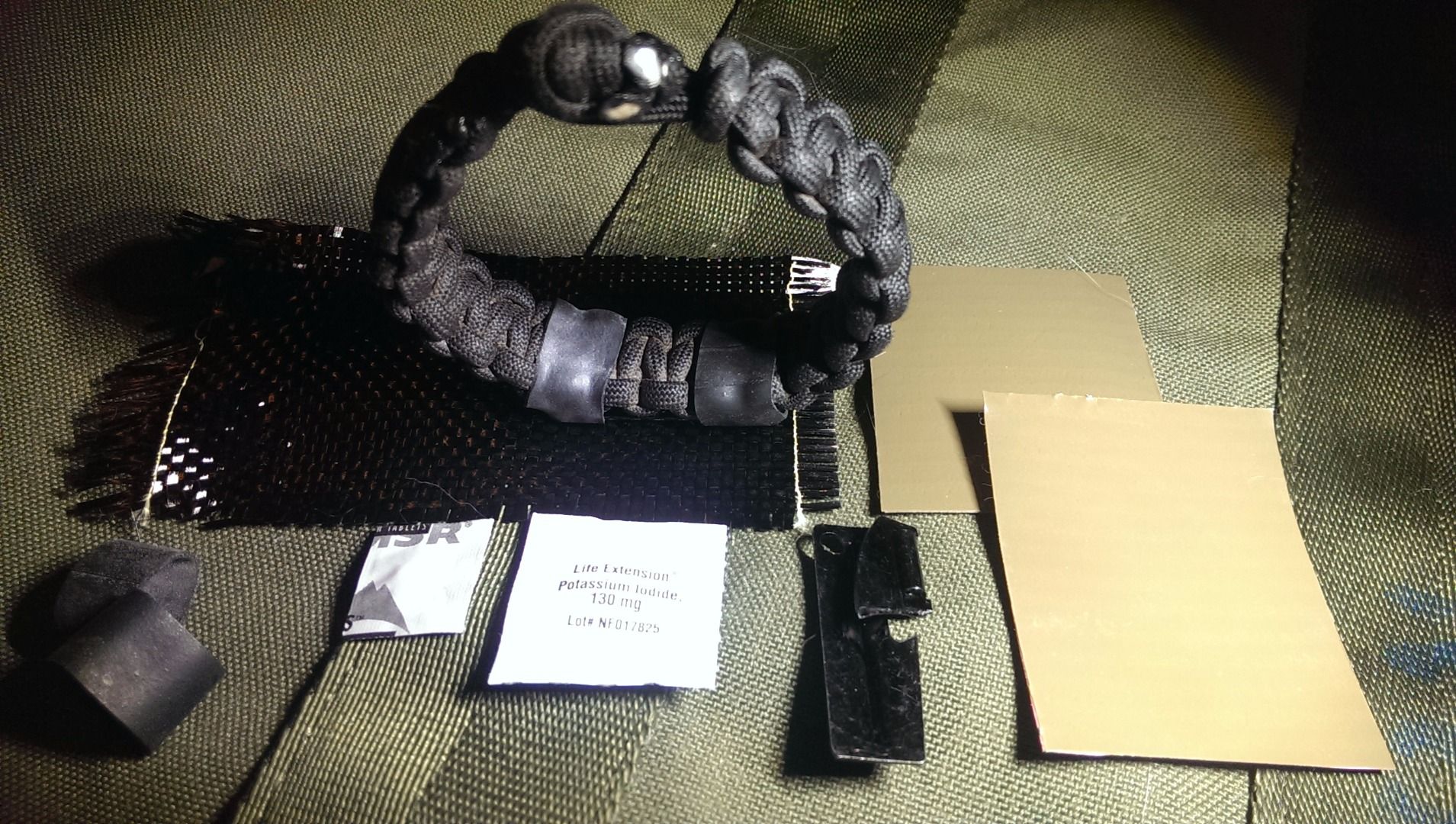 ​The Fallout Survivor: Nuclear and EMP Ready Paracord Bracelet- Anti-Radiation Tablet, Water Purification, Multi-Tool, Carbon Fiber Gas Mask