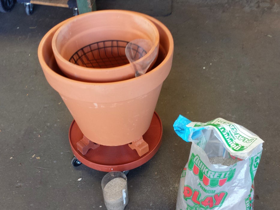 Fill the Gap With Sand, Add Water, and Top With Decorative Rocks