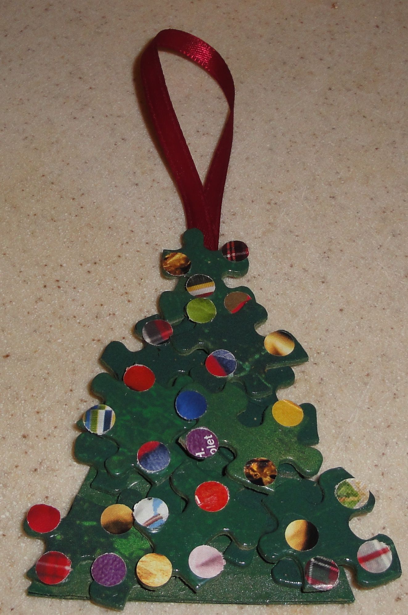 How to Create a Fun and Easy Christmas Tree Ornament From Recycled Items.