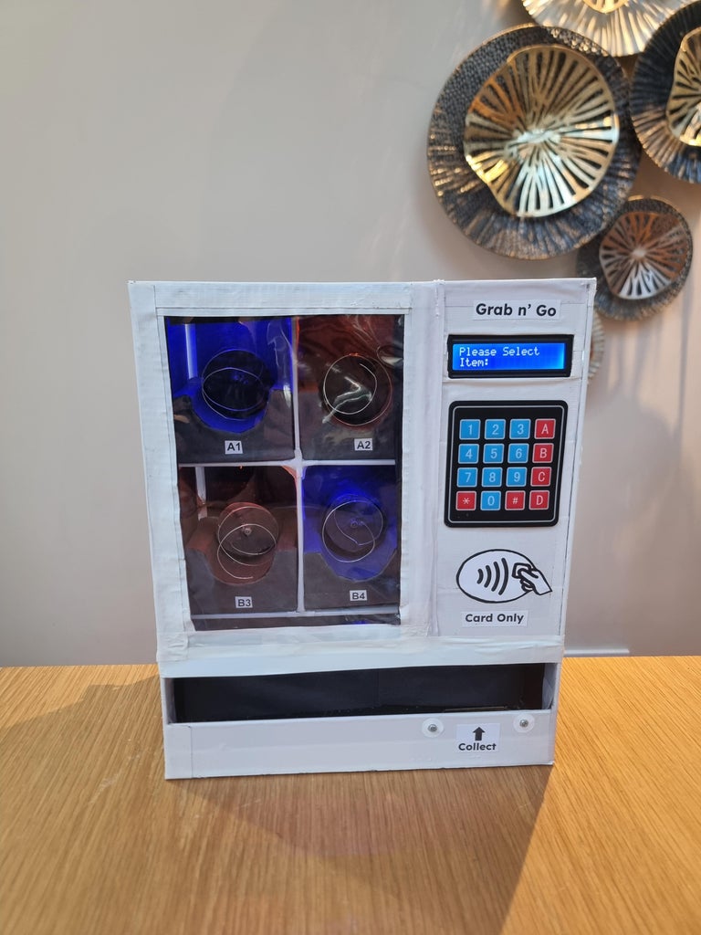Craft Your Own Desktop-Sized Cardboard Vending Machine With an Arduino ...