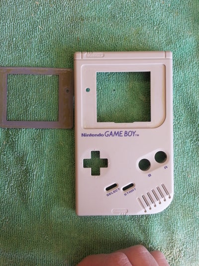 Dis-assembly of Holster, Game Boy, and Wiimote