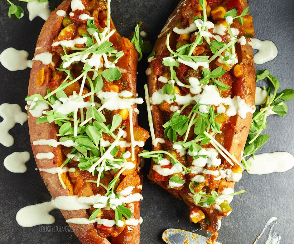 Korma Stuffed Sweet Potatoes With a Garlic Tahini Dressing