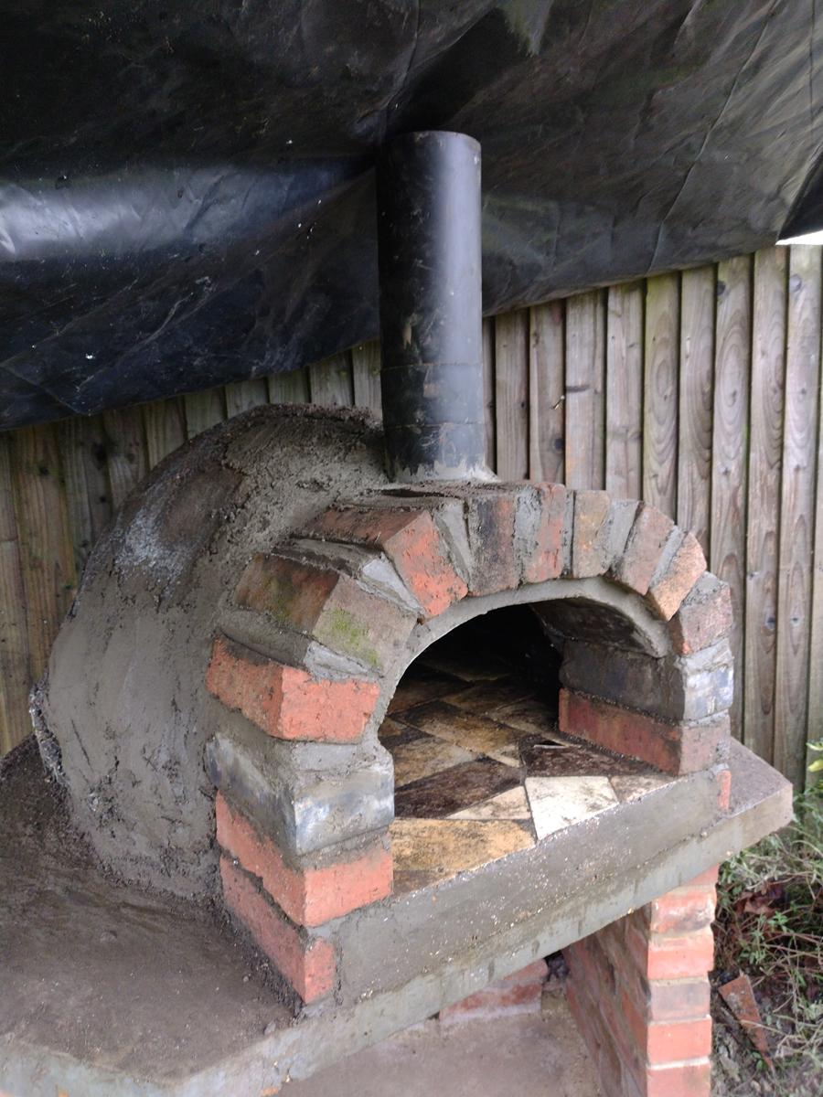 Incorporating the Chimney Flue and Building the Arched Opening