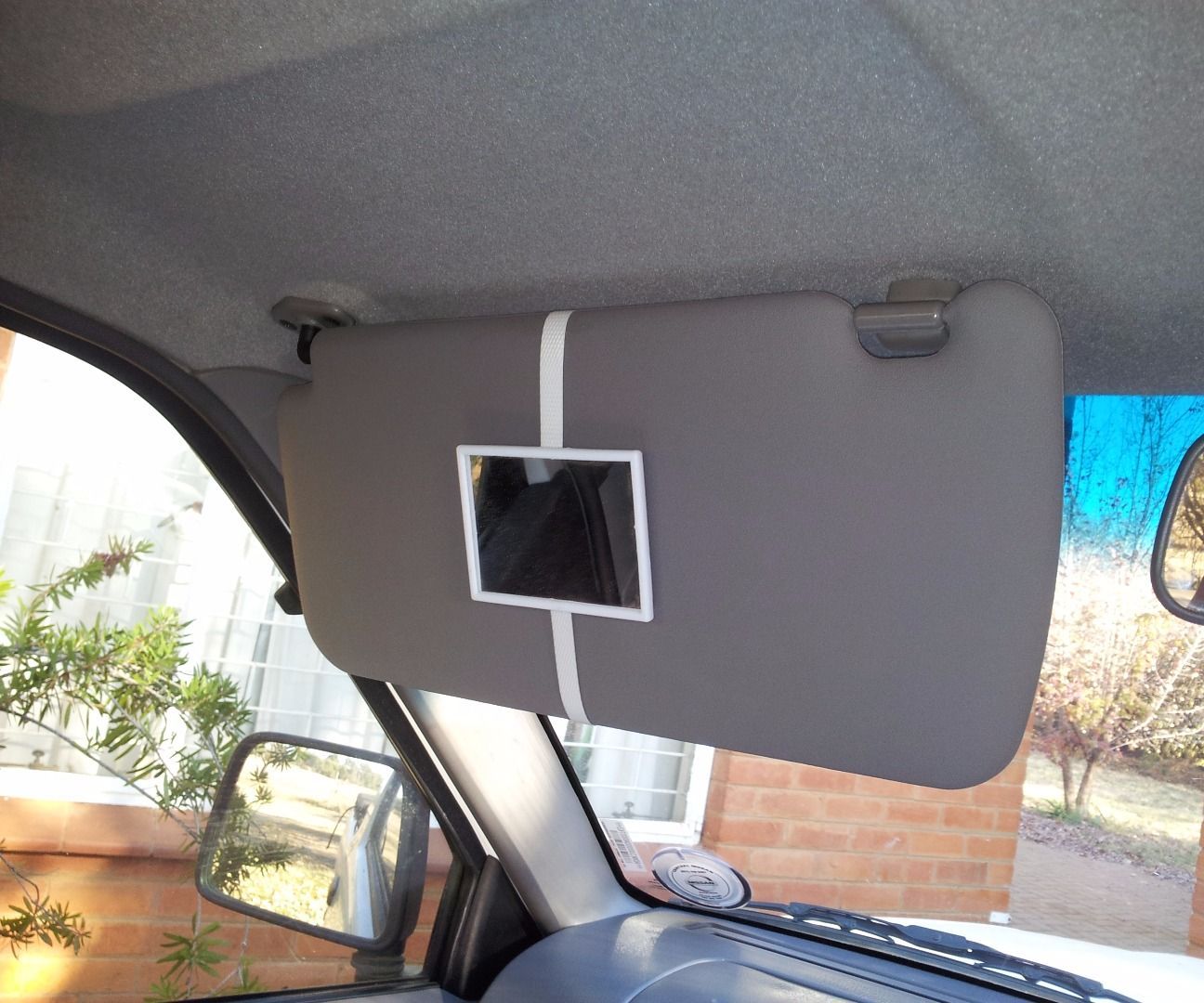 Fitting Vehicle With Vanity Mirrors