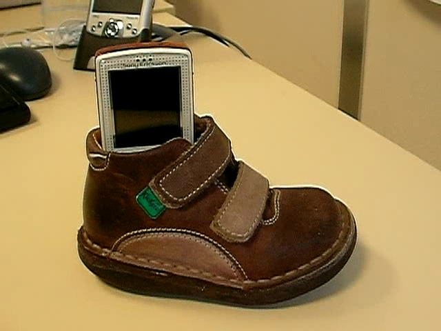 Mobile Stand With Kid Shoes