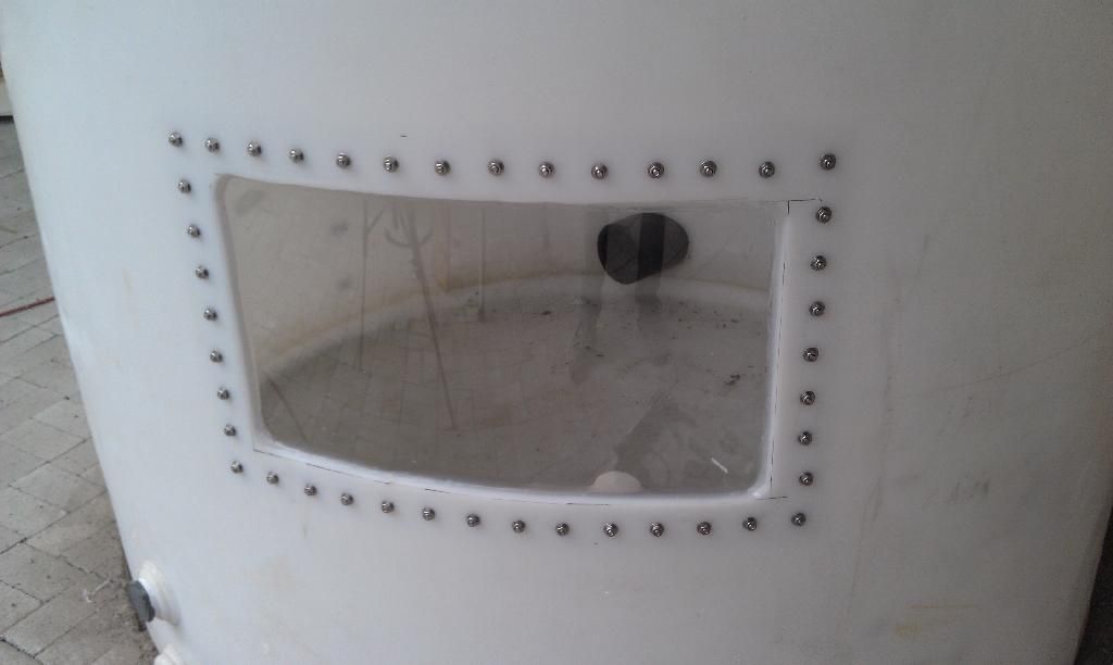 How to Install a Window Into a Tank