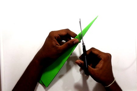 Cut the Paper Using Scissor Along the Mark Added in Previous Step