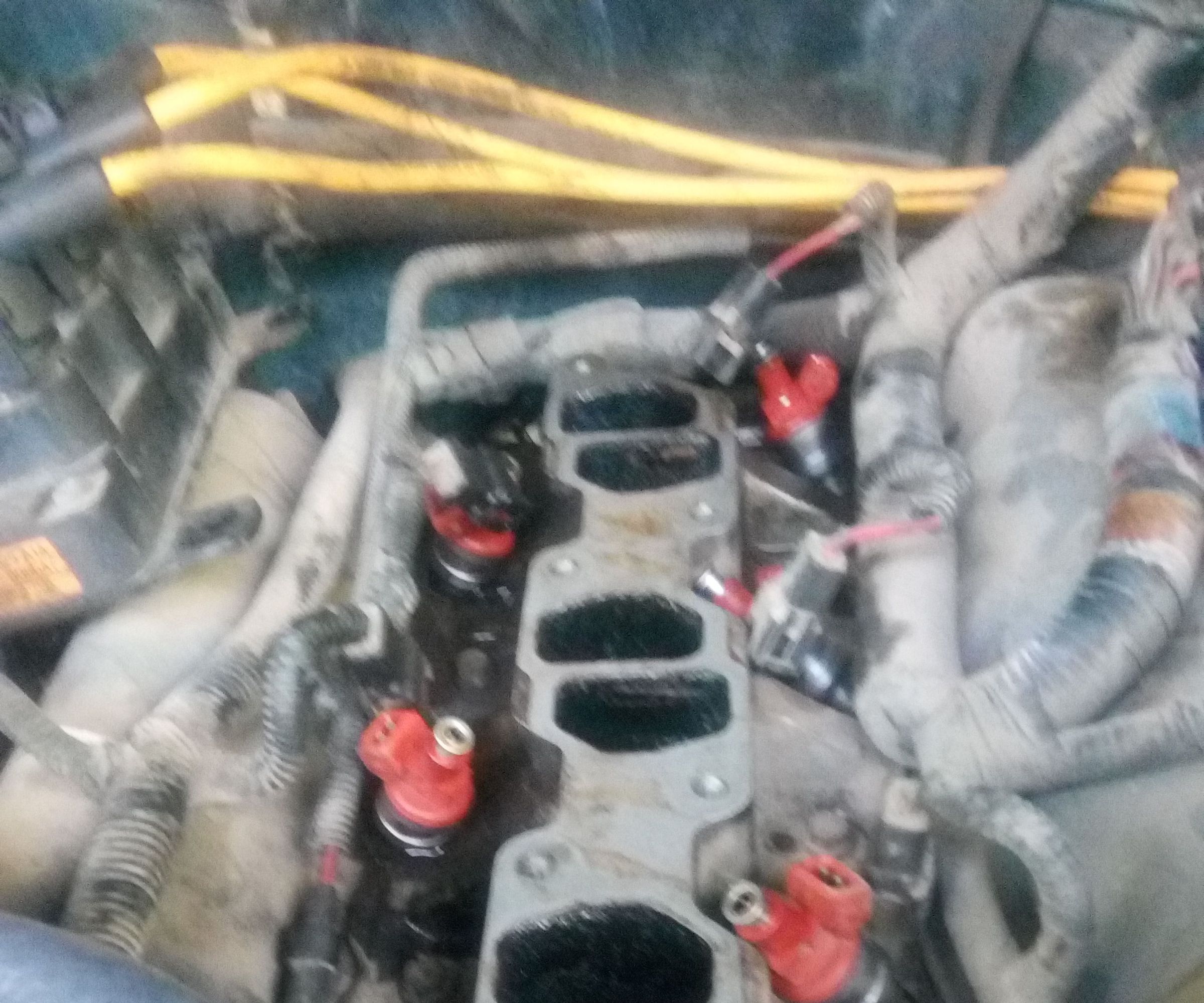 Remove Injectors for Cleaning in a 1995 Ford Explorer, 6 Cylinders