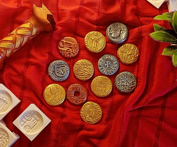 Recreating Currency of the Ages With a 3d Printed Stamp Kit and Multiple Designs.