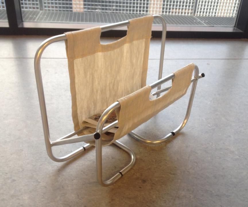 Flat packed newspaper rack