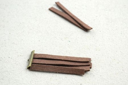 Stuff the Suede Segments Into the Ribbon End. Usually I Prepare 6 Strips for One. Stack Them Into Two Layers