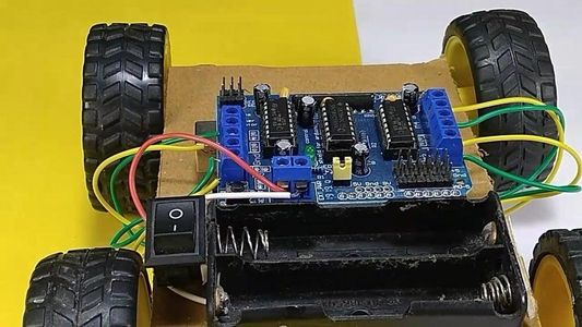 Attach the Motor Driver With the Arduino Uno & Connecting the Motor Wires With the Motor Driver: