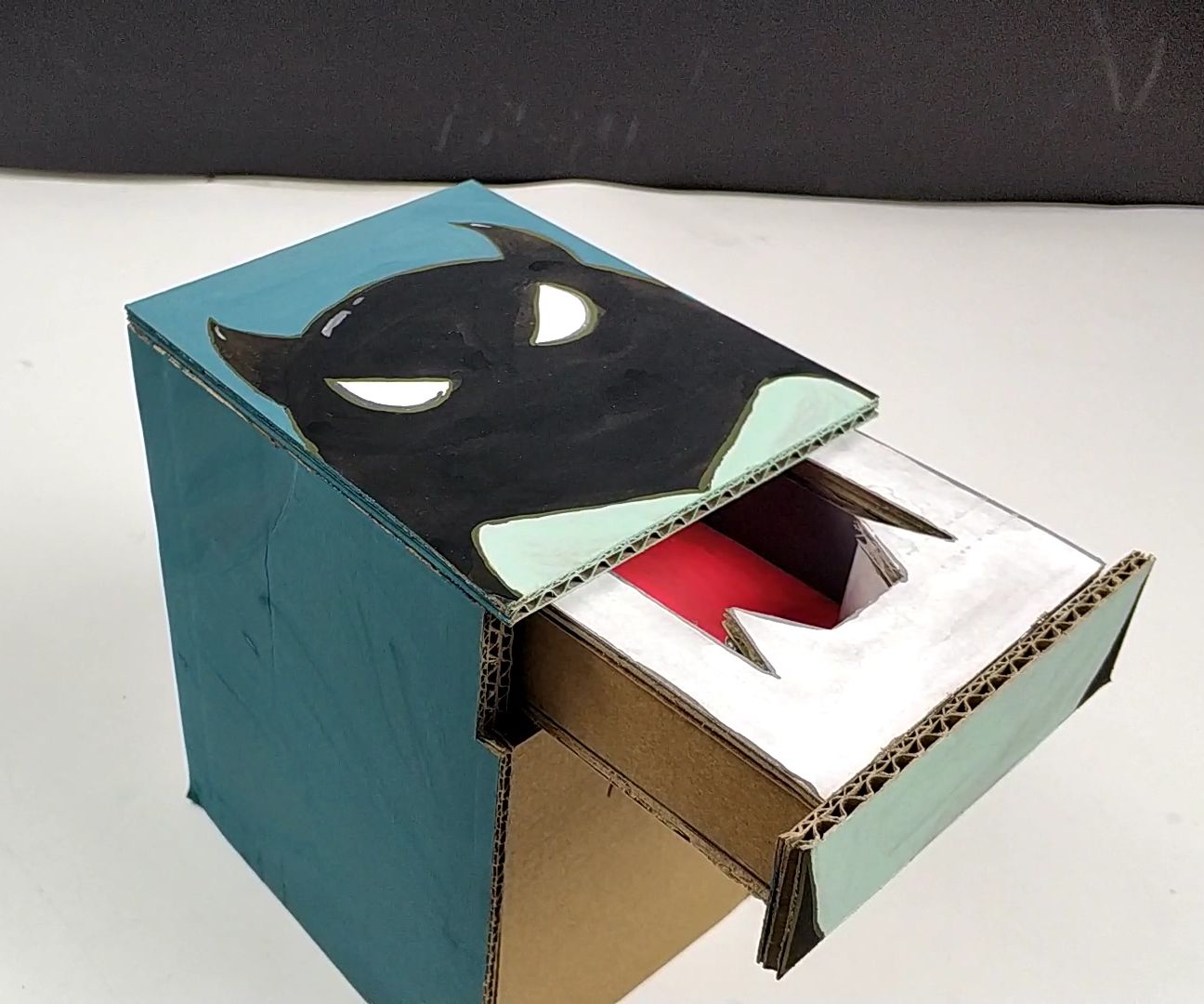 How to Make a Small Demon Magic Piggy Bank With Cardboard
