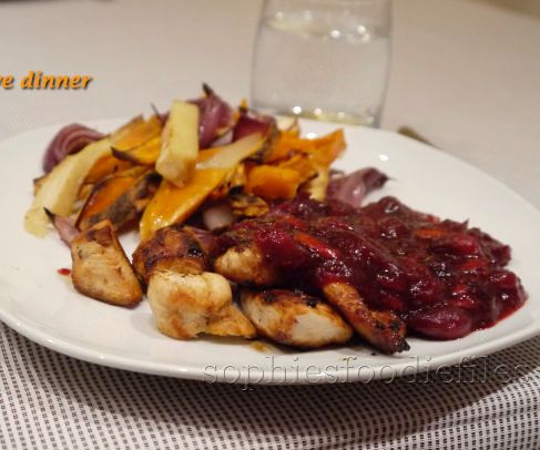 Chicken Served With a Cranberry, Port, Cinnamon Sauce Served With Oven Roasted Parsnips, Red Onion & Sweet Potato Fries