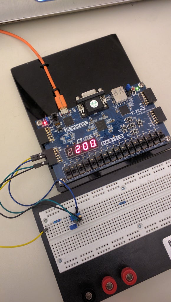 BASYS-3 Flow Metering ANALOG TO DIGITAL Using Vhdl and the XADC