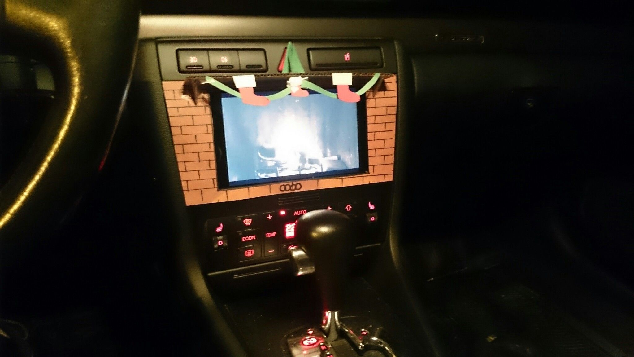 Christmas themed tablet fireplace in your car