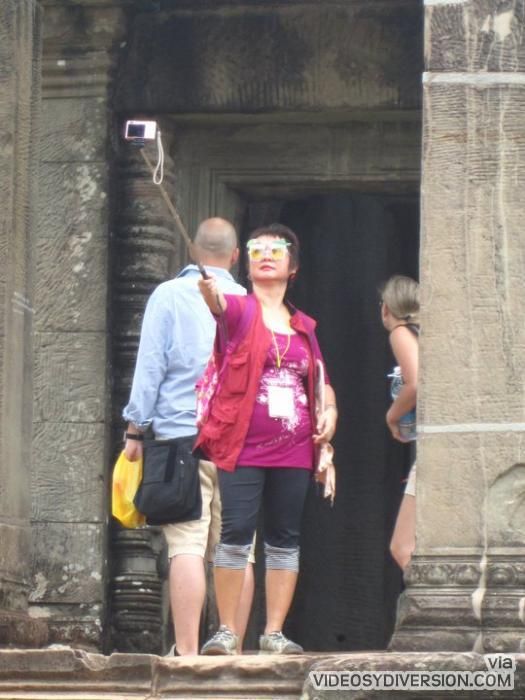 Cheap, Easy to Use, and Compact Self-portrait Arm Extention.