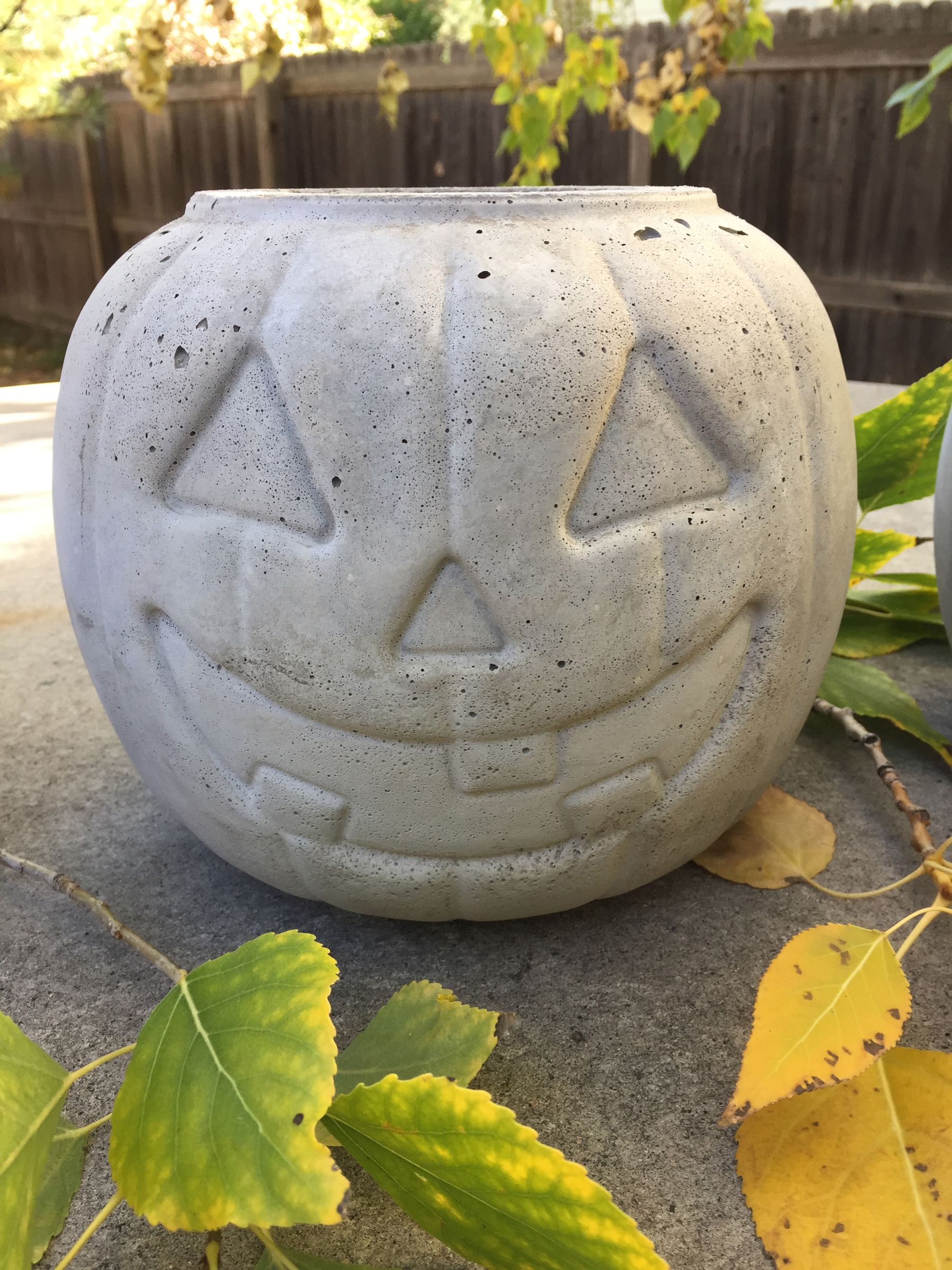 Transform a Candy Bucket Into a Concrete Pumpkin Planter 4 Steps
