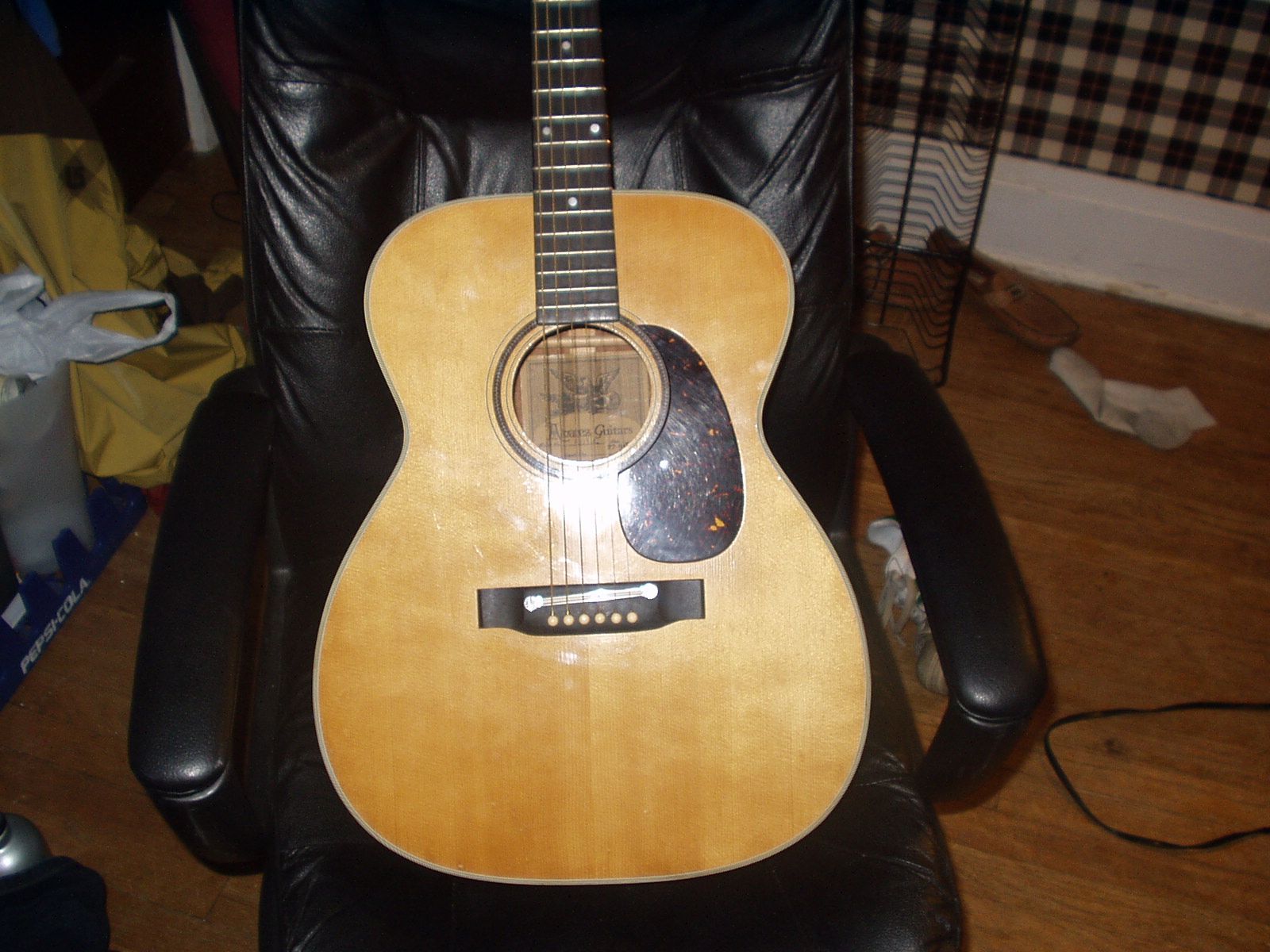 How to Fix the Backing of an Acoustic Guitar