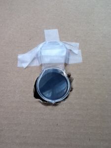 Tape the Magnifying Glass on the Box