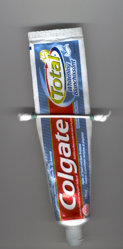 Tooth paste squeezer