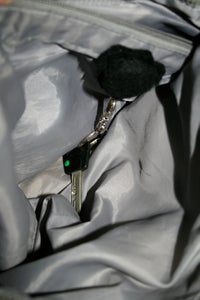Attach Key to Hook, and to Bag