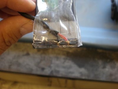 Slip the Battery and Wires Into the Sleeve