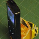 Corn Flakes packet iphone/ multimedia device stand