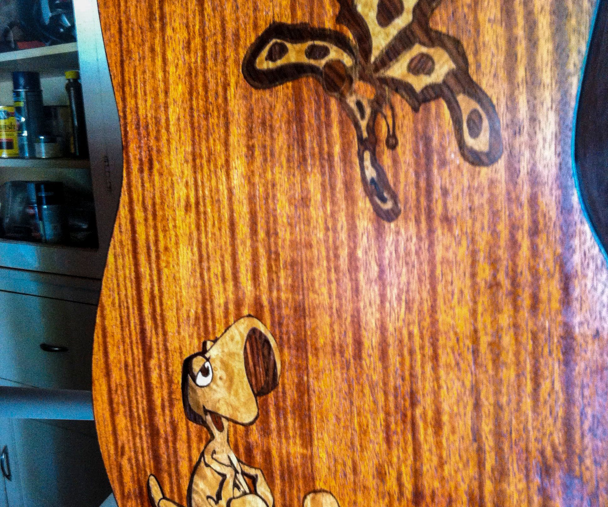 "Cartoon-style" Inlay on an Acoustic Guitar
