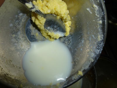 Use a Spoon to Drain Out Milk / Whey From the Butter