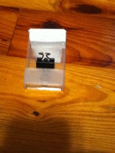 Taping the Paper Clip Thingy to the Tic Tac Box