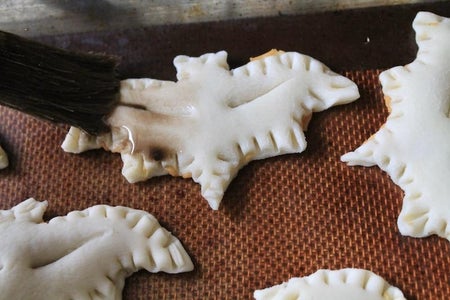 Brush Your Mini Pie Crust Pop Tarts With a Spooky Bat Wing Egg Wash!