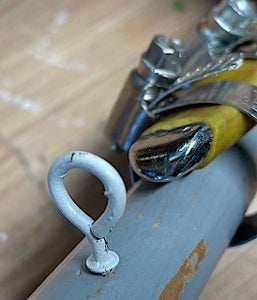 INSTALL SCREW EYE AND PARACORD