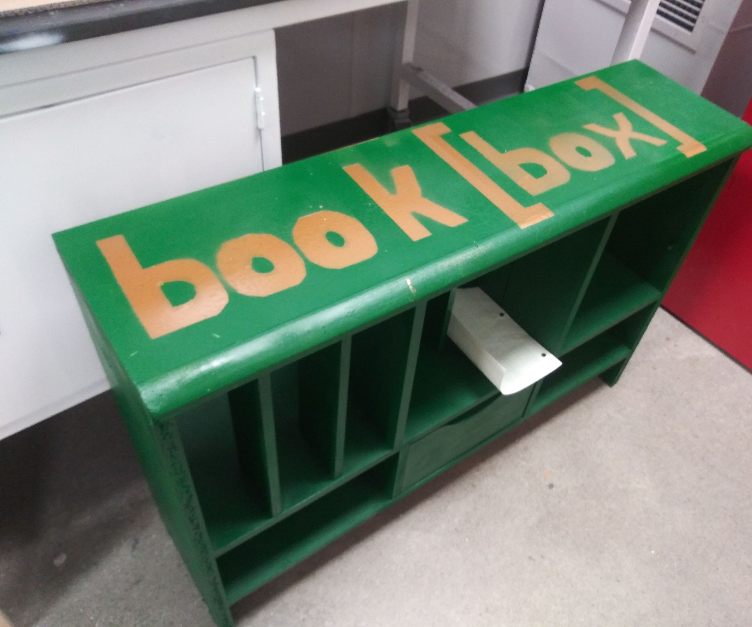 Spray Painting an Old Bookshelf With Stencils
