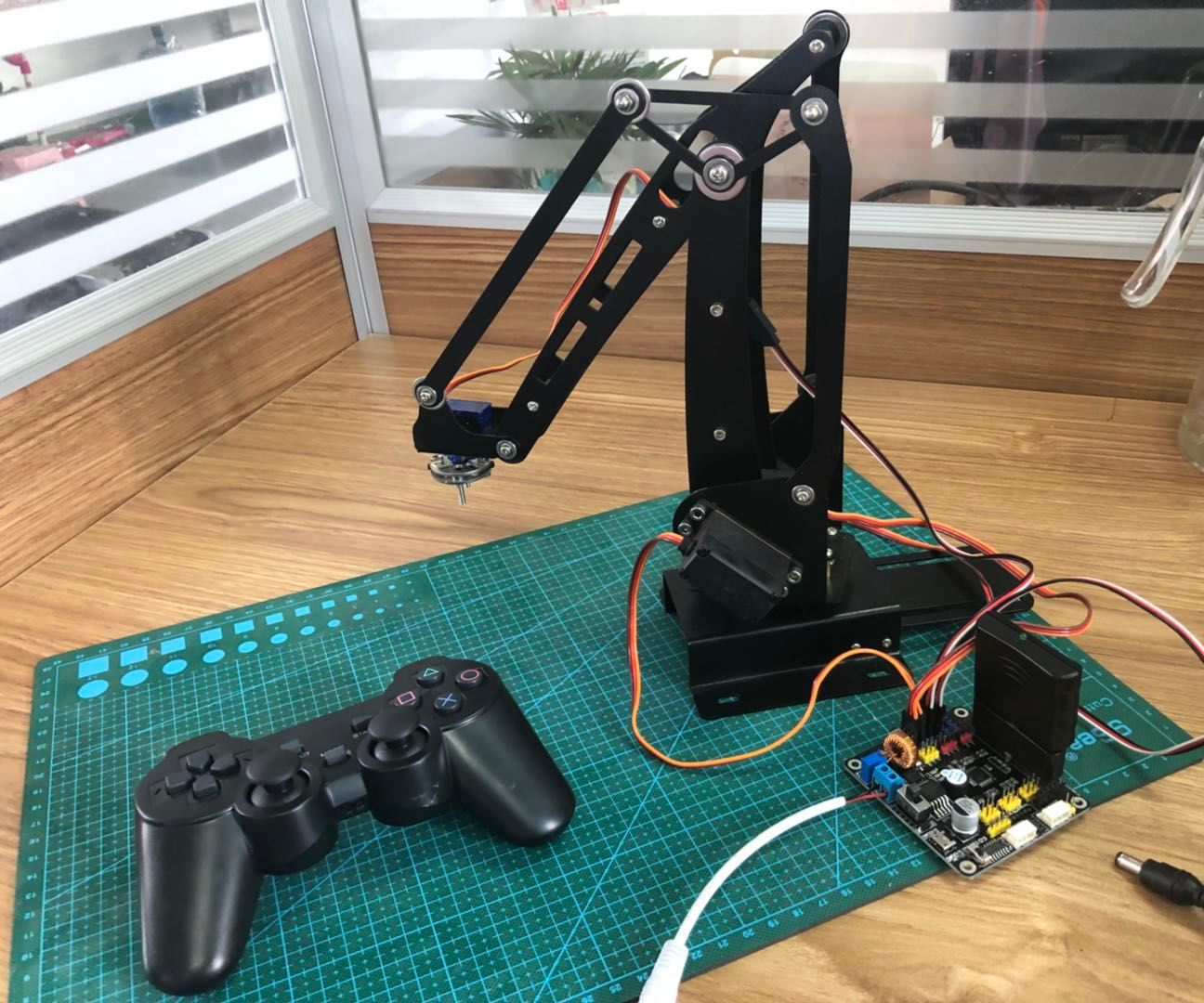 How to Control a 4dof High Power Big Size Robot Arm With Arduino and Ps2 Remote Control?
