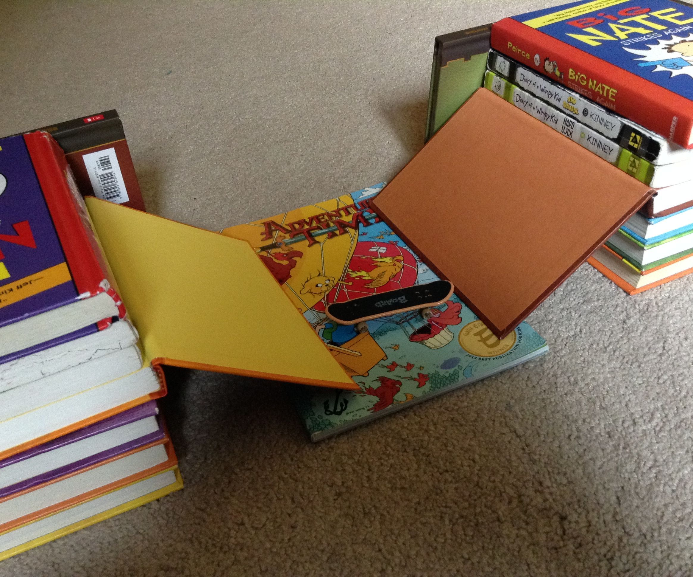 How to Make a Fingerboard Half Pipe Ramp With Books